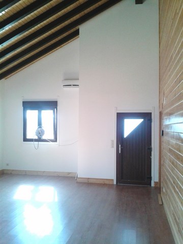 Vivienda de planta baja construida de entramado.