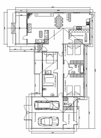 Vivienda de planta baja, en forma de L.